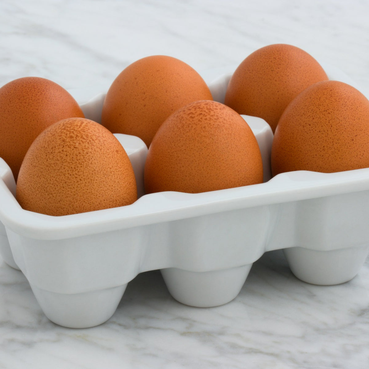 Brown eggs in a tray