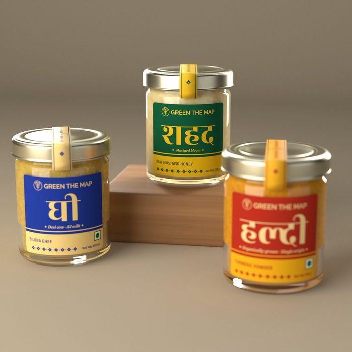 Ghee, honey and turmeric jars on a table